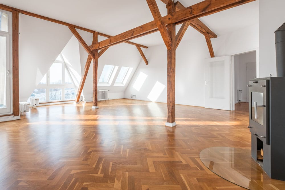 penthouse apartment interior , loft room with stove, parquet fl Houten vloeren Rijswijk kopen